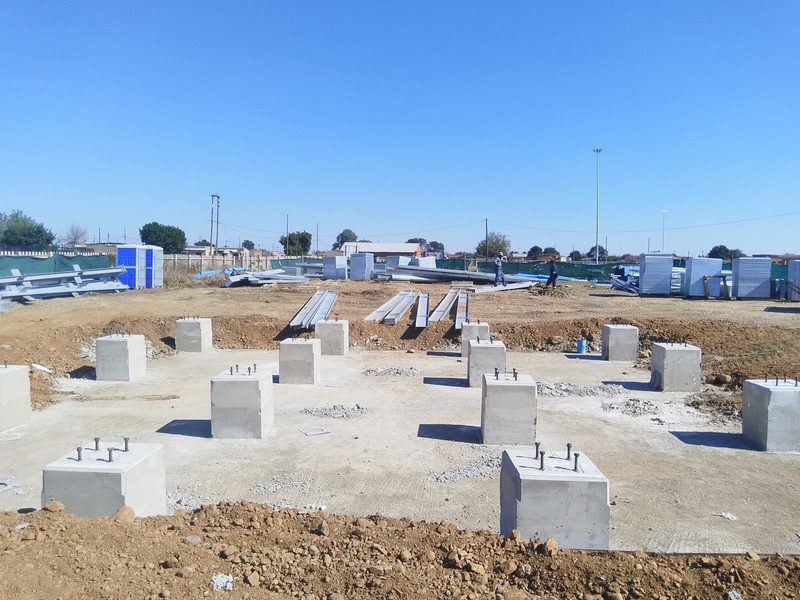 Elevated tank tower foundations under construction